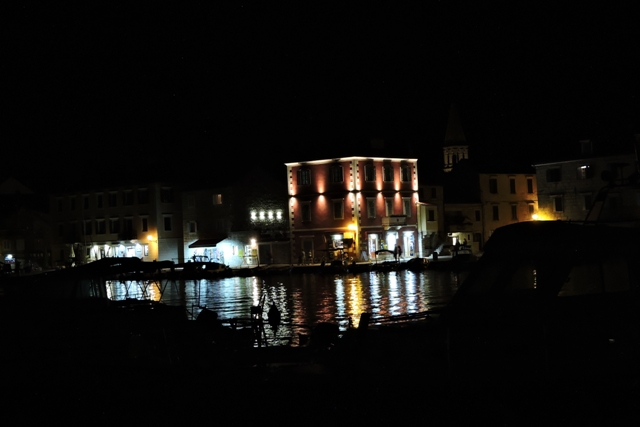 Floodlit building on the Riva